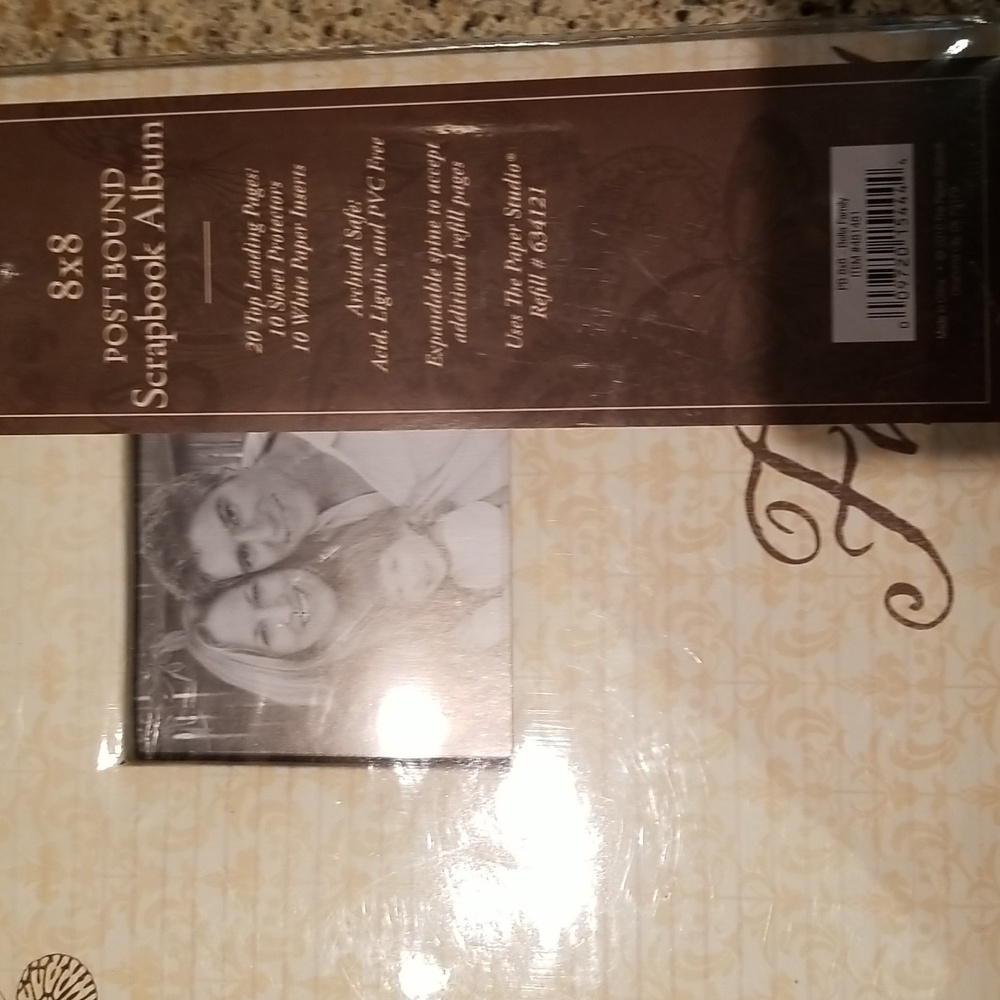 8x8 scrapbook album NWTS family written on front